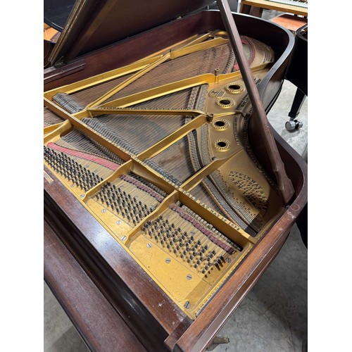 96 - Steinway (c1910)A 5ft 10in Model O grand piano in a rosewood case on square tapered legs; mounted on... 