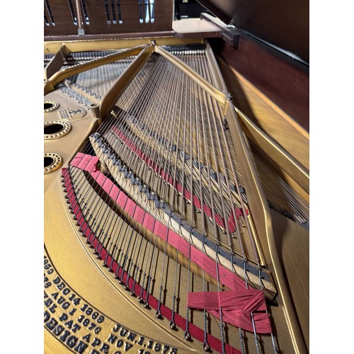 96 - Steinway (c1910)A 5ft 10in Model O grand piano in a rosewood case on square tapered legs; mounted on... 