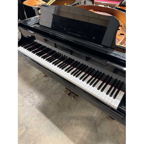 97 - Yamaha (c2005)A Model GB1K grand piano in a bright ebonised case on square tapered legs.