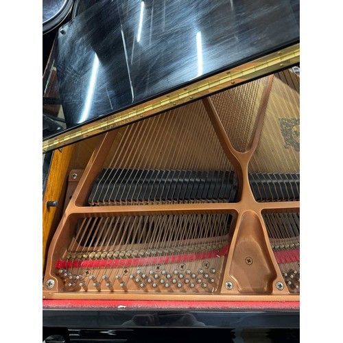 97 - Yamaha (c2005)A Model GB1K grand piano in a bright ebonised case on square tapered legs.