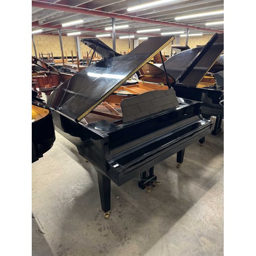 97 - Yamaha (c2005)A Model GB1K grand piano in a bright ebonised case on square tapered legs.