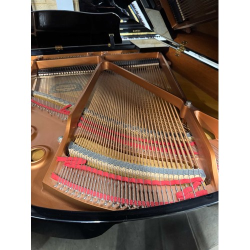 97 - Yamaha (c2005)A Model GB1K grand piano in a bright ebonised case on square tapered legs.