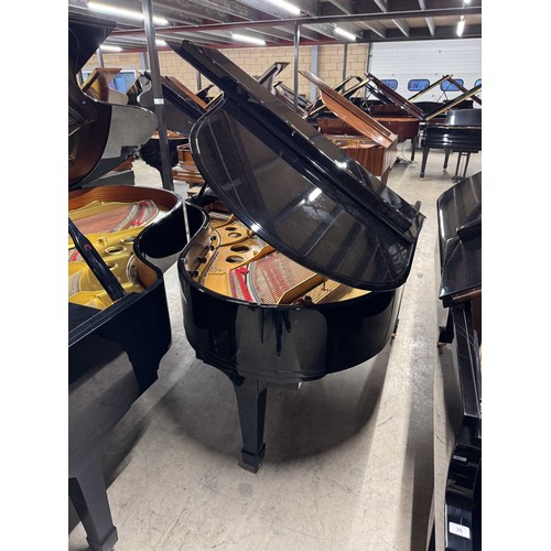 98 - Steinway (c1924)A 5ft 10in Model O grand piano in a bright ebonised case on square tapered legs. Thi... 