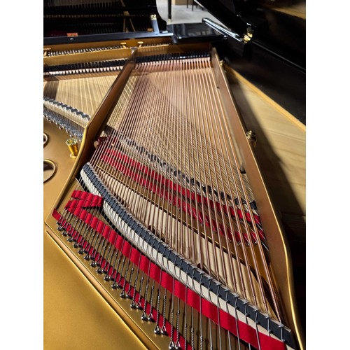 98 - Steinway (c1924)A 5ft 10in Model O grand piano in a bright ebonised case on square tapered legs. Thi... 