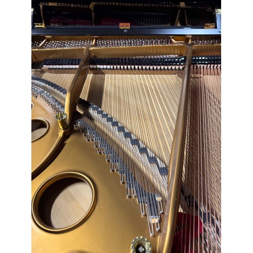 98 - Steinway (c1924)A 5ft 10in Model O grand piano in a bright ebonised case on square tapered legs. Thi... 