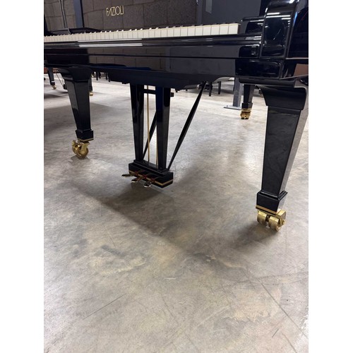 100 - Fazioli (c2000)A 7ft 6in Model F228 grand piano in a bright ebonised case on square tapered legs; to... 