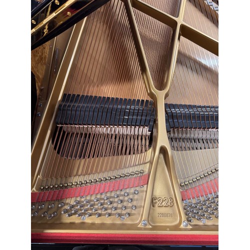 100 - Fazioli (c2000)A 7ft 6in Model F228 grand piano in a bright ebonised case on square tapered legs; to... 