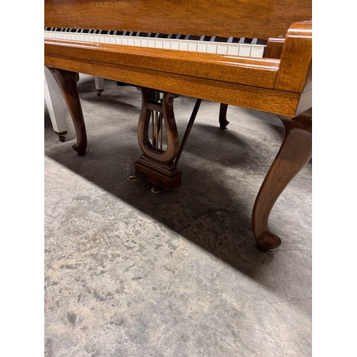 102 - Steinway (c1937)A 5ft 1in Model S grand piano in a walnut case on cabriole legs. IRN: F1CSF553