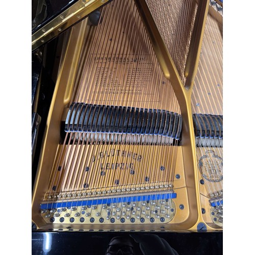 104 - Blüthner (c1913)A 6ft 3in Style 8 grand piano in a bright ebonised case on turned and fluted legs; t... 