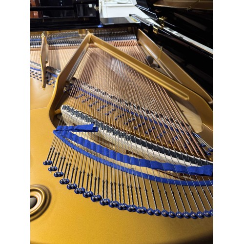 104 - Blüthner (c1913)A 6ft 3in Style 8 grand piano in a bright ebonised case on turned and fluted legs; t... 