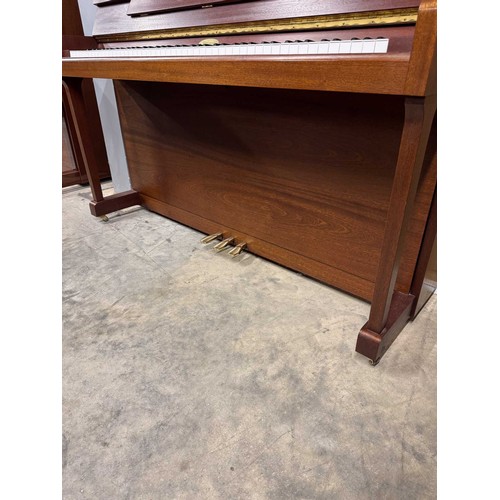 106 - Kemble (c1996)A Model Oxford upright piano in a traditional satin mahogany case.