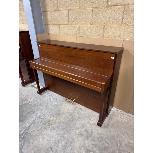 106 - Kemble (c1996)A Model Oxford upright piano in a traditional satin mahogany case.