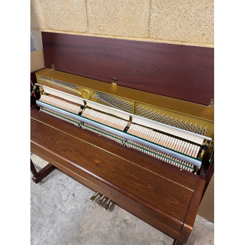 106 - Kemble (c1996)A Model Oxford upright piano in a traditional satin mahogany case.