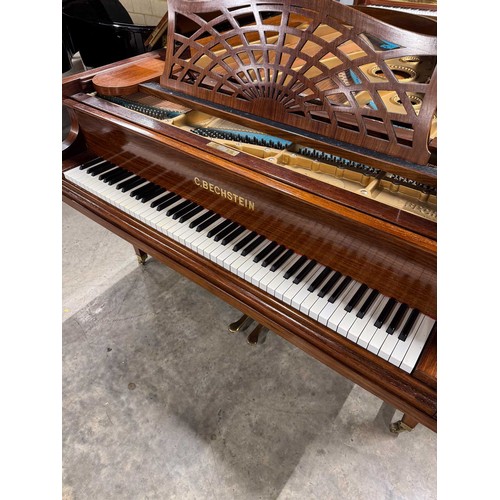 107 - Bechstein (c1904)A 6ft 7in Model B grand piano in a rosewood case on dual square tapered legs; toget... 