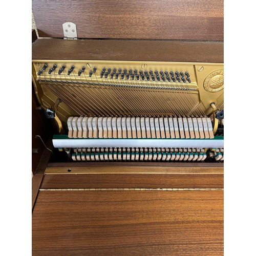 111 - Yamaha (c1979)A Model M5J upright piano in a modern style teak case.