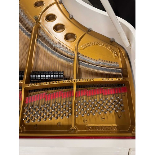 113 - Steinway (c1928)A 5ft 7in Model M grand piano in a bright white case on square tapered legs; togethe... 