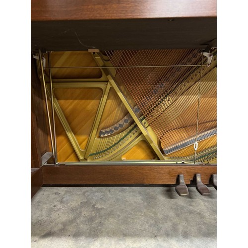 115 - Yamaha (c1989)A Model U1 upright piano in a traditional satin walnut case; together with a duet stoo... 