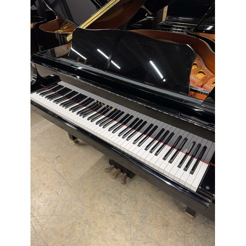 119 - Yamaha (c2002)A 4ft 11in Model GA1 grand piano in a bright ebonised case on square tapered legs; tog... 