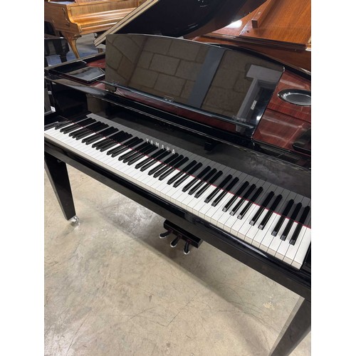 122 - Yamaha (c2016)A Model N3 digital grand piano in a bright ebonised case on square tapered legs; toget... 