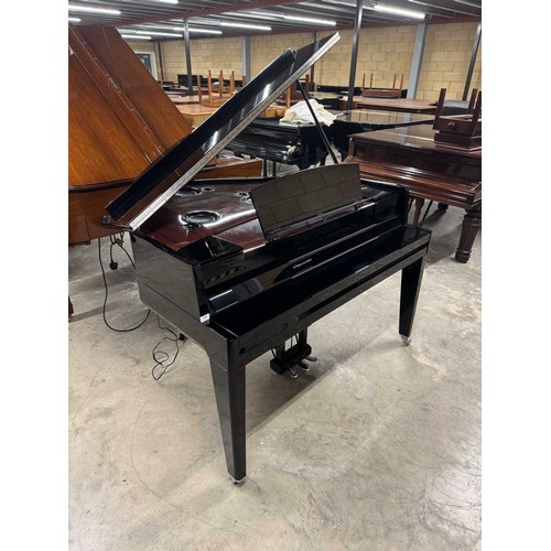 122 - Yamaha (c2016)A Model N3 digital grand piano in a bright ebonised case on square tapered legs; toget... 