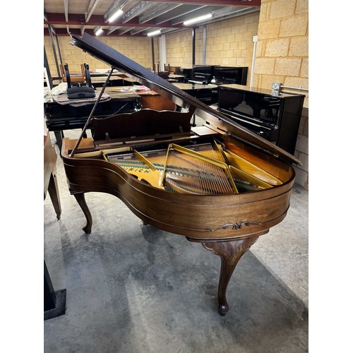 123 - Feurich (c1975)A 5ft 6in grand piano in a walnut case on cabriole legs; together with a stool.