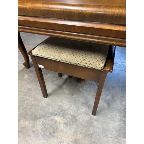 123 - Feurich (c1975)A 5ft 6in grand piano in a walnut case on cabriole legs; together with a stool.