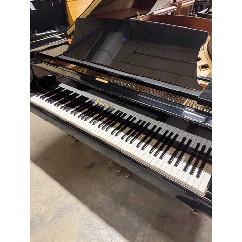 131 - Boston (c2009)A 7ft Model 215 grand piano in a bright ebonised case on square tapered legs.