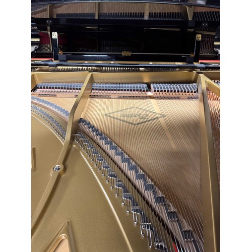 131 - Boston (c2009)A 7ft Model 215 grand piano in a bright ebonised case on square tapered legs.