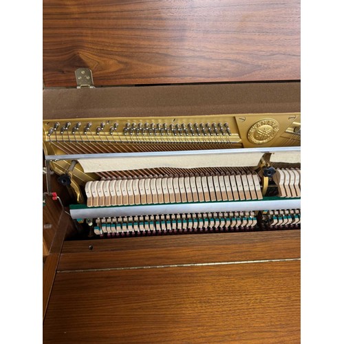 11 - Yamaha (c1984)A Model M5J upright piano in a teak case.