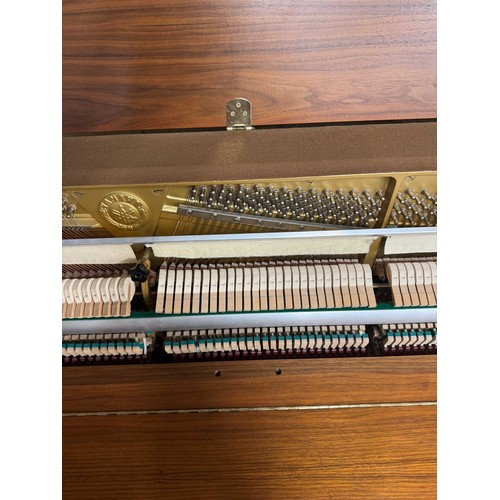 11 - Yamaha (c1984)A Model M5J upright piano in a teak case.