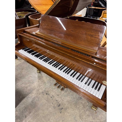 79 - Grotrian Steinweg (c1985)A 6ft 2in Model 189 grand piano in a walnut case on square tapered legs; to... 