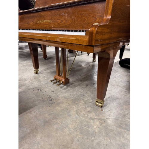 79 - Grotrian Steinweg (c1985)A 6ft 2in Model 189 grand piano in a walnut case on square tapered legs; to... 