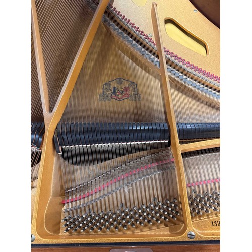 79 - Grotrian Steinweg (c1985)A 6ft 2in Model 189 grand piano in a walnut case on square tapered legs; to... 