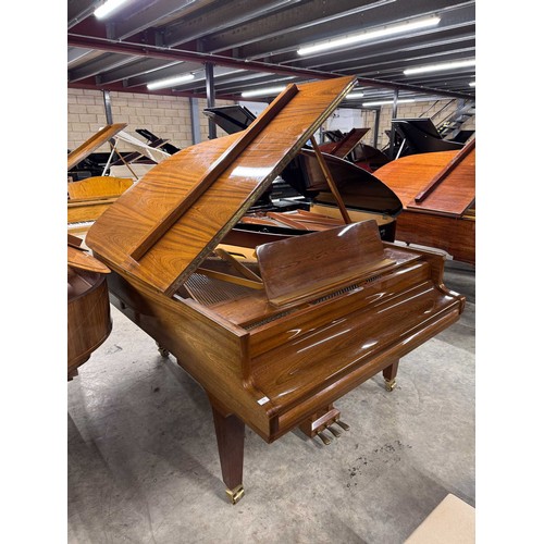 79 - Grotrian Steinweg (c1985)A 6ft 2in Model 189 grand piano in a walnut case on square tapered legs; to... 