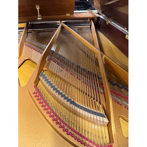 79 - Grotrian Steinweg (c1985)A 6ft 2in Model 189 grand piano in a walnut case on square tapered legs; to... 