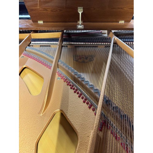 79 - Grotrian Steinweg (c1985)A 6ft 2in Model 189 grand piano in a walnut case on square tapered legs; to... 