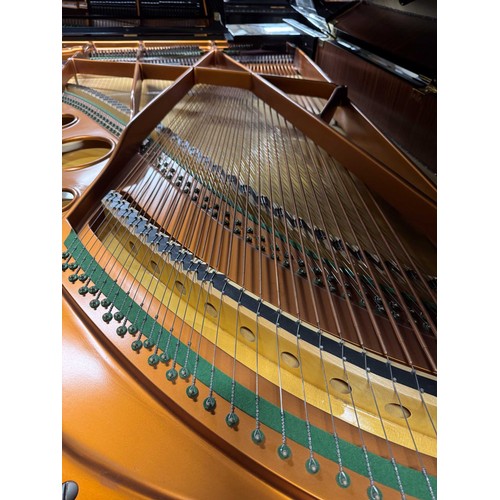 83 - Bösendorfer (c1989)A 7ft 4in Model 225 grand piano in a bright ebonised case on square tapered legs.... 