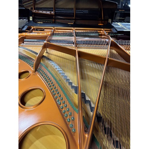 83 - Bösendorfer (c1989)A 7ft 4in Model 225 grand piano in a bright ebonised case on square tapered legs.... 