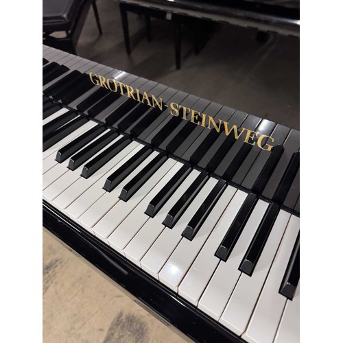 109 - Grotrian Steinweg (c1987)A 6ft 3in Model 192 grand piano in a bright ebonised case on square tapered... 