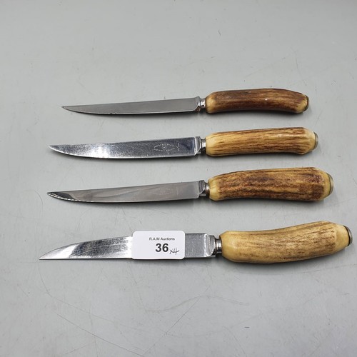 36 - 4 Bone Handled Knives.