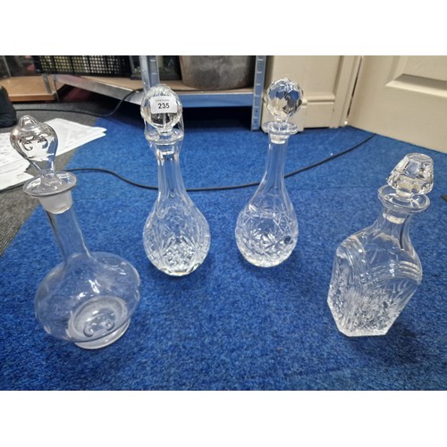 235 - 4 Crystal Decanters.