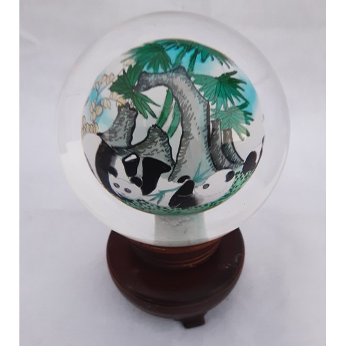 67 - Oriental Glass Orb on Stand depicting Pandas in Bamboo.