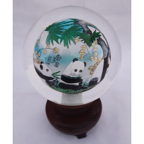 67 - Oriental Glass Orb on Stand depicting Pandas in Bamboo.