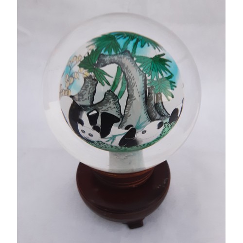 67 - Oriental Glass Orb on Stand depicting Pandas in Bamboo.