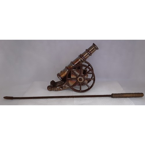 702 - Cast Iron Cannon Poker Stand.`