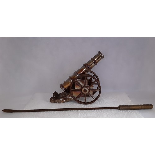 702 - Cast Iron Cannon Poker Stand.`