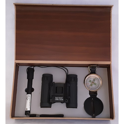 712 - Boxed Compass, Binoculars and Torch Set.