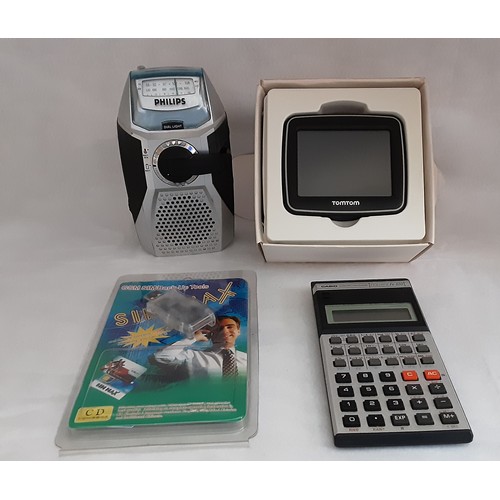 716 - Phillips Wind Up Radio, Tom Tom Sat Nav, Calculator and Sim Card.