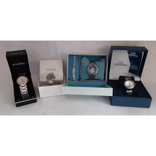 719 - 4 Boxed Watches 1 With A Silver Toned Bracelet.