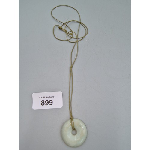 899 - Jade Pendant On A String Necklace.